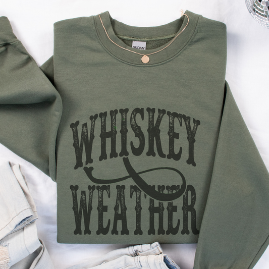 Green sweatshirt with 'Whiskey Weather' text on a white background