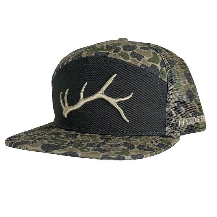 Camouflage cap with antler design on a white background