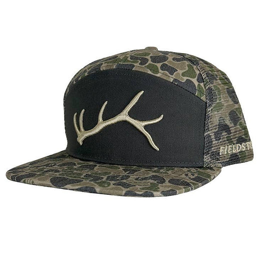 Camouflage cap with antler design on a white background