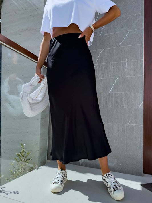 Long satin skirt with elastic at the waist.