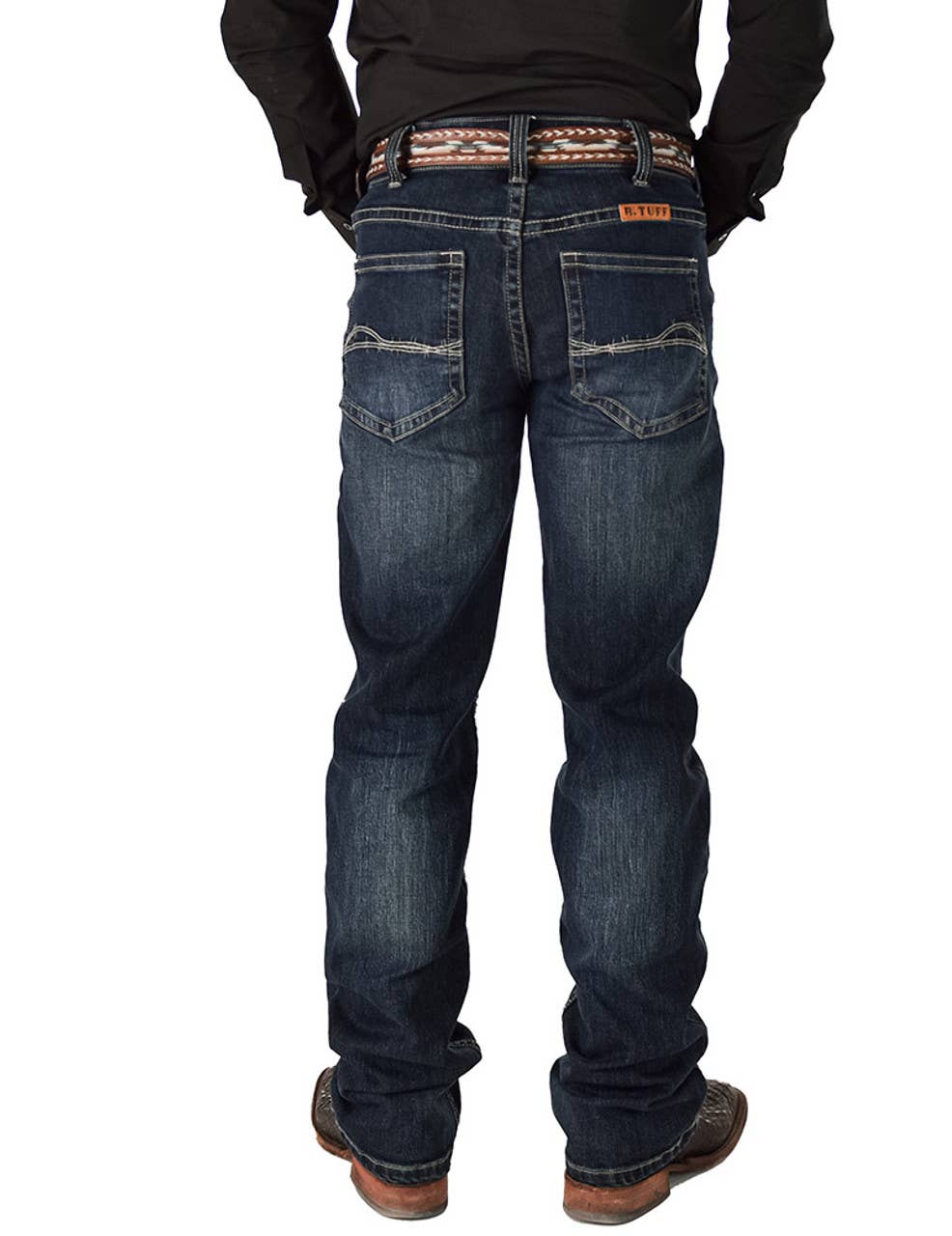 Blue jeans worn by a person on a white background