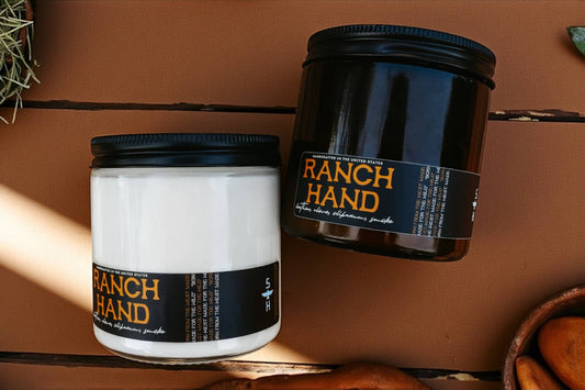 Two 'Ranch Hand' containers on a wooden surface